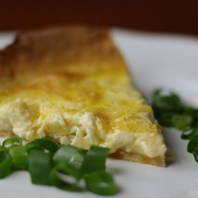 Swiss Cheese Quiche / Quiche au Fromage de Gruyere close look on the plate shot