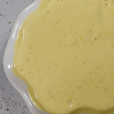 A bowl of fresh olive oil mayonnaise.