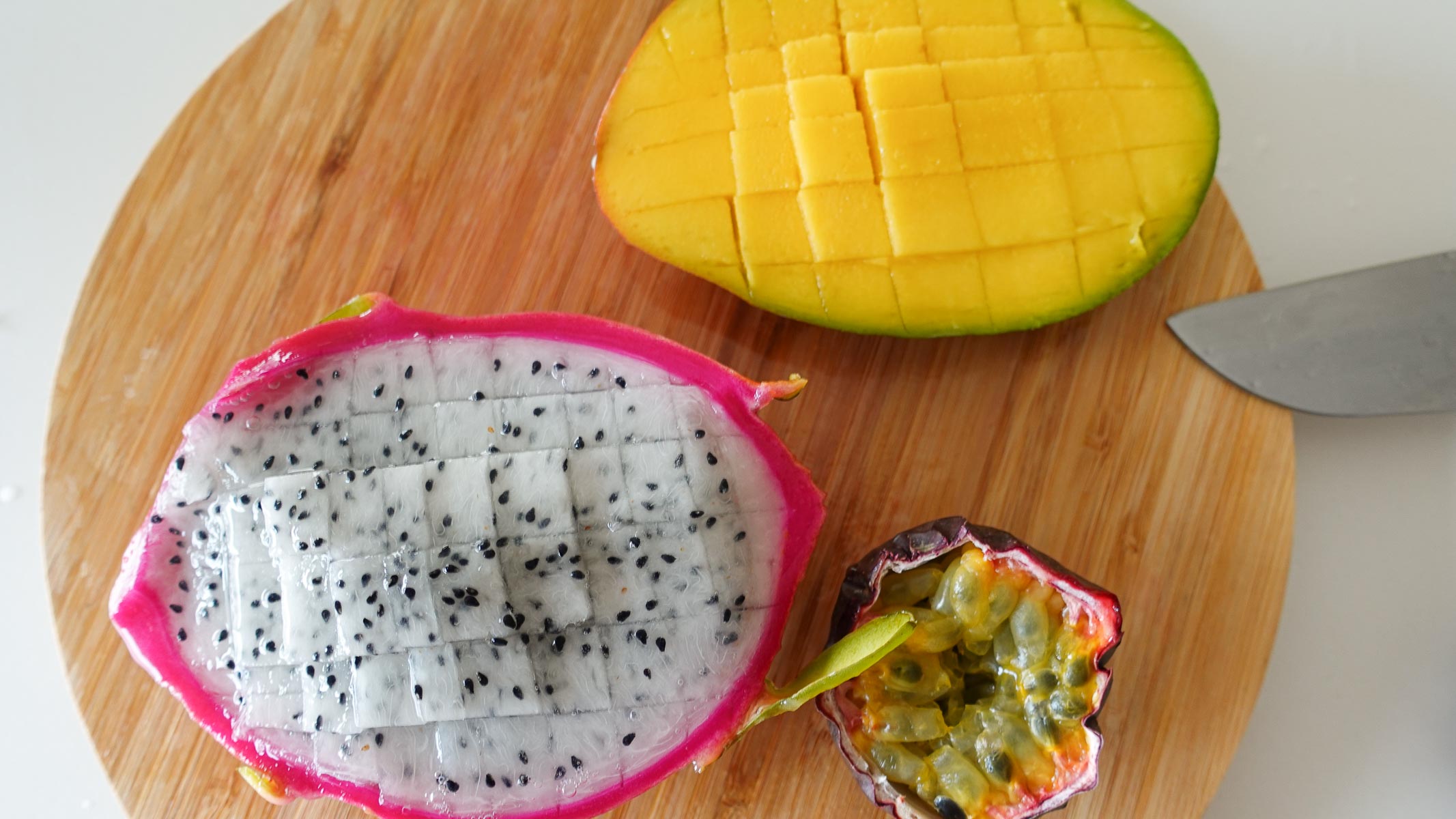 Cut mango, dragon fruit and passion fruit