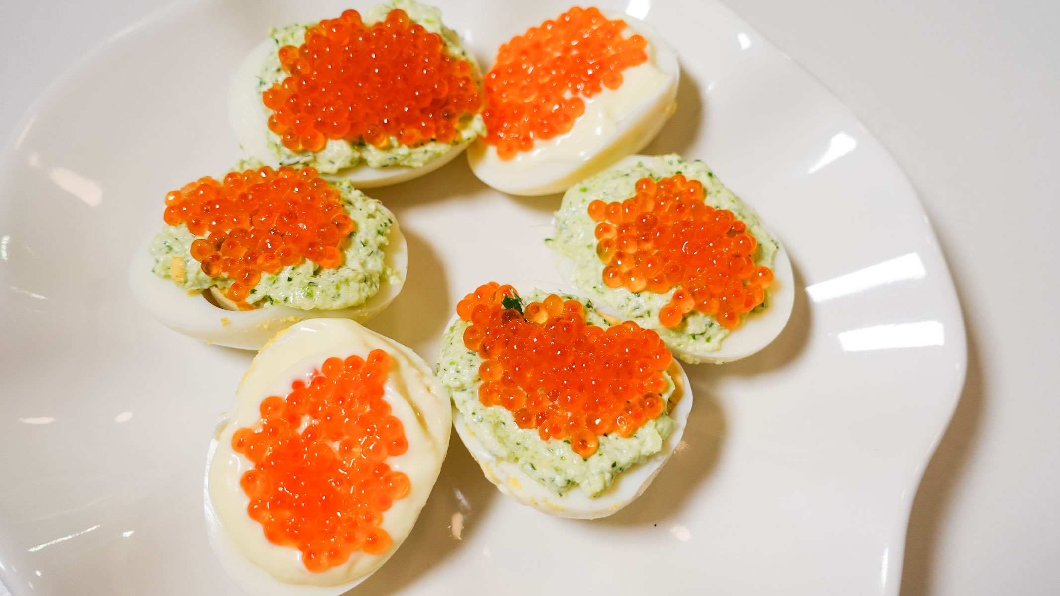 Salmon Caviar Deviled eggs on a table