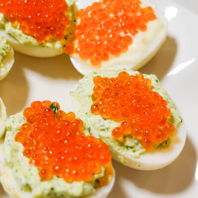 Salmon Caviar Deviled Eggs on a serving plate