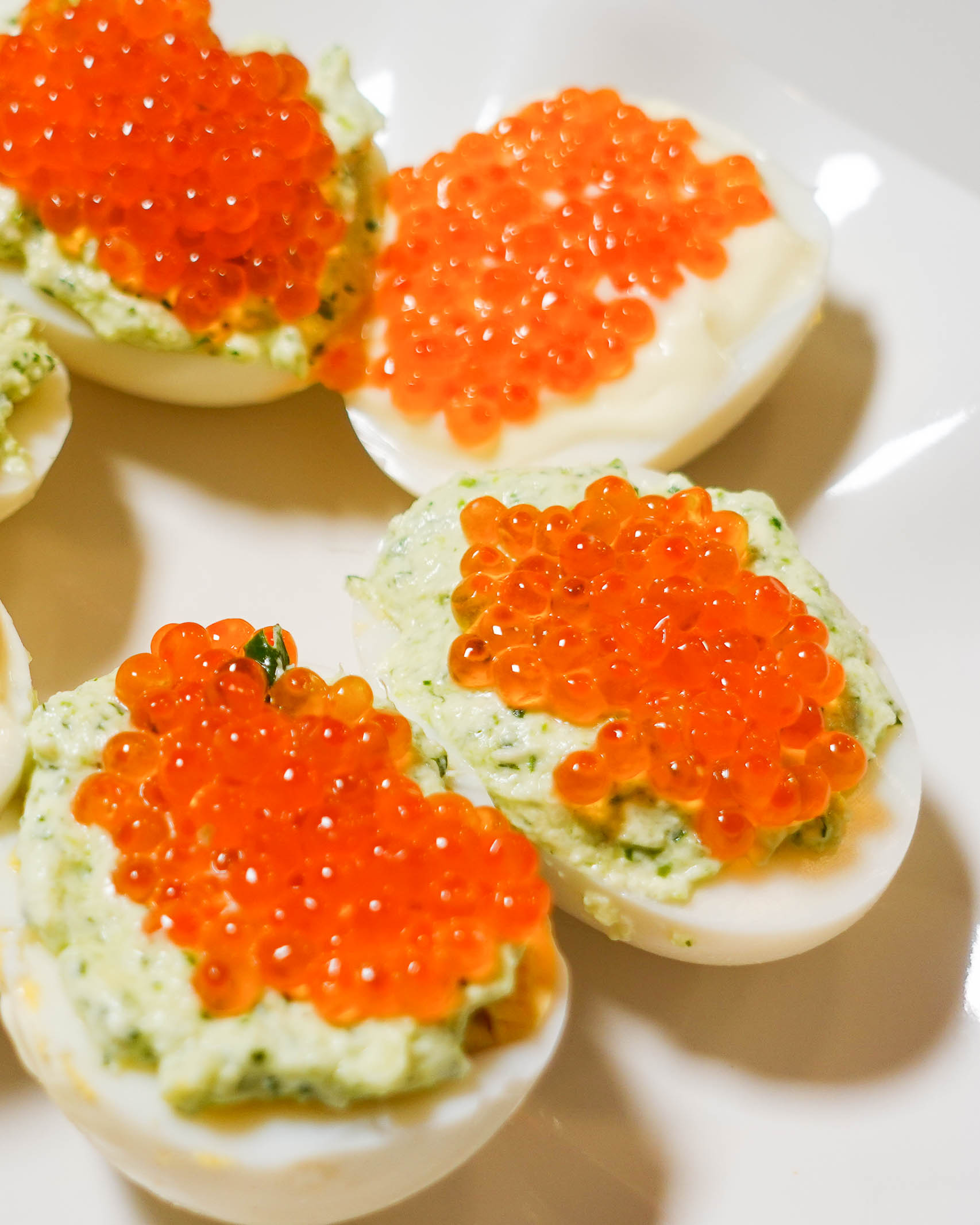 Salmon Caviar Deviled Eggs on a serving plate