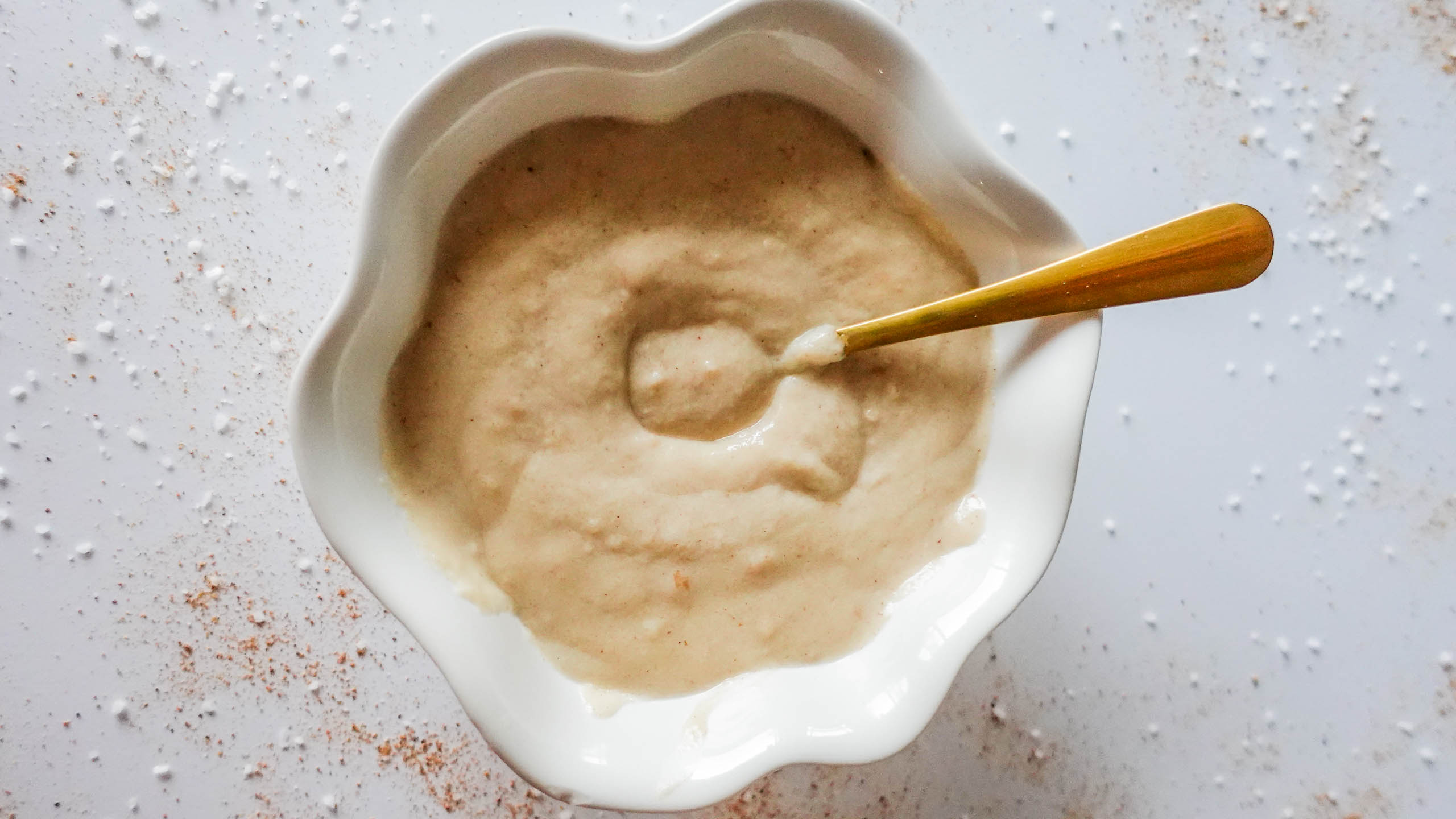 Bechamel Sauce in a bowl with spoon