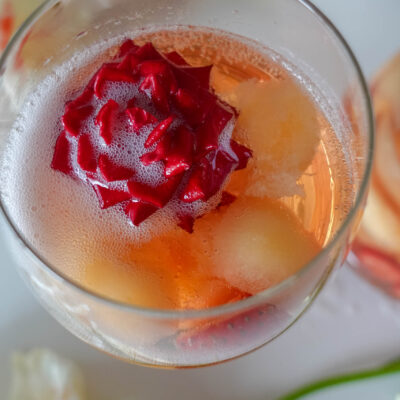 A glass of the delicious Sparkling Strawberry Melon Sangria served on a special occasion
